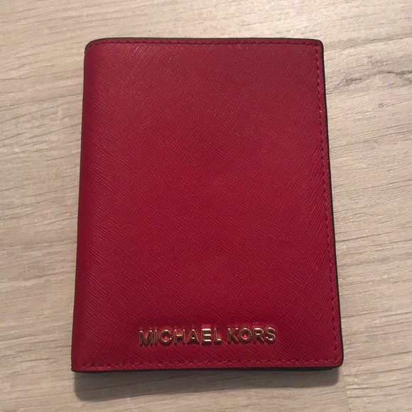 Michael Kors Handbags - NWT Michael Kors Passport Wallet
